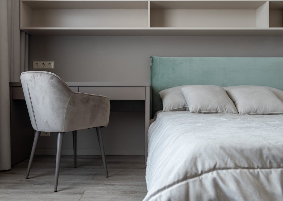 A clean, modern bedroom — many budget mattresses hide a fiberglass fire barrier beneath the cover