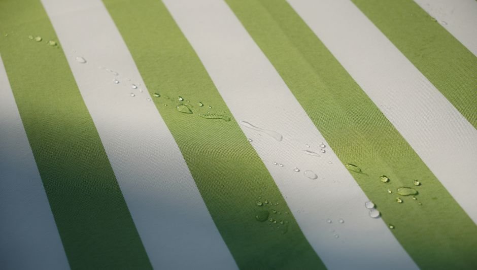 Water beading on treated fabric — the water- and stain-repellent effect associated with PFAS finishes